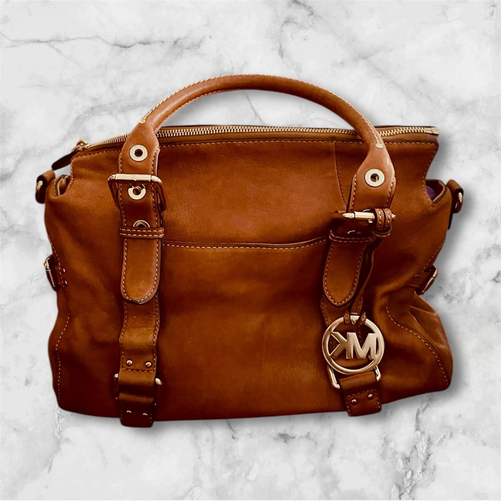 Michael Kors Satchel with Gold logo hang tag and MK dust bag. Good condition.